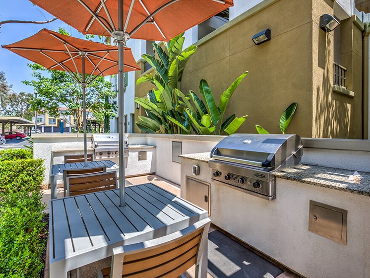 Outdoor Grill With Intimate Seating Area at Miro Apartments, California